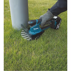 Haie et cisaillement d'herbe Makita DUM604ZX; 18 V sans fil; 20 cm longueur (sans batterie et chargeur)