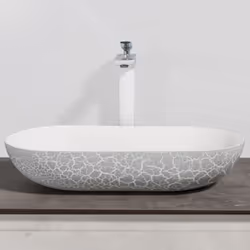 DESIGN : Cette vasque à poser sans robinet est fabriquée en fonte minérale avec une finition effet pierre gris mat écaillé. D ...