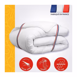 La couette DODO Tempérée est enveloppée d'une housse 100 % polyester traité à l'aloe vera. Son garnissage 100 % fibre polyest ...