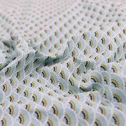 Tissu coton motif géométrique KOI vert Mthe