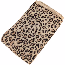 Drap de douche pur coton 70x140 cm LEOPARD beige Plongez dans l'univers sauvage et élégant de la collection LEOPARD, où la ma ...