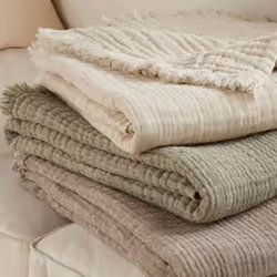 Plaid gaze de coton et laine 125x180 cm ESTRELA marron muscade Ce plaid en gaze de coton et laine de la collection ESTRELA es ...