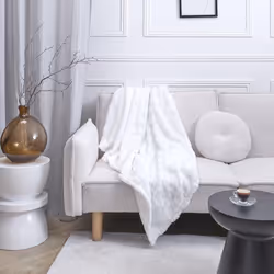 Plaid Hohneck Plongez dans la douceur et le confort avec ce plaid flanelle damier blanc et beige. Parfait pour un moment coco ...