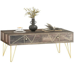 Table basse design - 2 tiroirs - dim. 110L x 59l x 42H cm - piètement épingle métal doré aspect bois