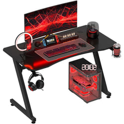 Homcom - Bureau gaming plateau effet fibre de carbone dim. 120L x 65l cm bracket casque porte-gobelet passe-câble noir