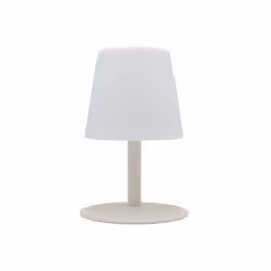 La lampe de table LED Standy Mini Cream est une lampe sans fil avec un pied en acier creme et une base LED blanc chaud/blanc ...