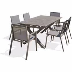 Ensemble repas composé d'une table en aluminium quartz avec rallonge automatique et de 6 fauteuils empilables en textilène et ...
