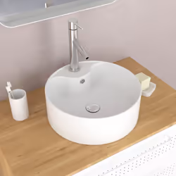 Description générale La vasque en céramique à poser ronde est un élément essentiel pour apporter une touche moderne à votre s ...