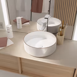 Découvrez notre vasque à poser design en céramique blanche avec un élégant liséré or rose : une véritable pièce maîtresse pou ...