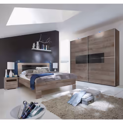 Chambre à coucher en panneaux de particules coloris chêne chataigne ( rechampis verre noir ) comprend un lit futon réglable e ...