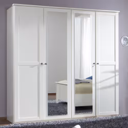 Armoire à 4 portes battantes, 2 miroirs, 2 grandes penderies et de 2 grandes compartiments de rangement dans son intérieur . ...