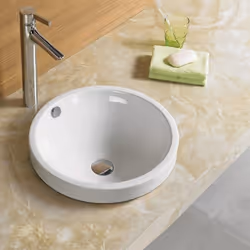 Laissez-vous séduire par la vasque semi-encastrable en céramique Rani pour votre salle de bain design. De forme ronde et de c ...