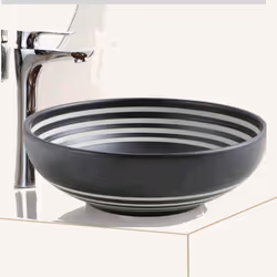 Chic et tendance, cette vasque pour salle de bain ronde en céramique noire mettra en valeur la décoration de votre salle de b ...