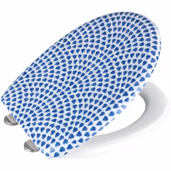 Le siège de WC design Sevilla en duroplast de WENKO est décoré de petits points bleus qui s'agencent pour former un motif har ...