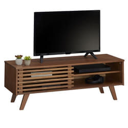 Meuble TV SEAN banc télé de 115 cm au design vintage avec 4 niches et 1 porte coulissante ajourée en pin massif lasuré brun foncé