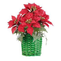 Composition florale de Noël avec poinsettias et panier tissé