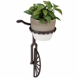 Grâce à ce porte-pot en fonte avec une roue décorative, vous pouvez mettre en valeur vos plantes à la maison. Le design rusti ...