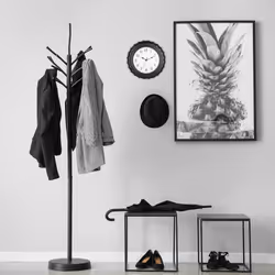 Relaxdays - Horloge murale, en forme de capsule, fonctionne avec pile, analogique, aiguille pour secondes, ø 33 cm, noire