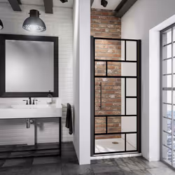 Description générale La porte de douche pivotante avec décor atelier, profilé noir et verre anticalcaire est une solution cla ...