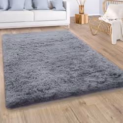 Même si le confort n’est pas souvent associé au sol plutôt froid, ces fabuleux tapis à longs poils parviennent à créer une pu ...