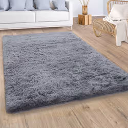 Même si le confort n’est pas souvent associé au sol plutôt froid, ces fabuleux tapis à longs poils parviennent à créer une pu ...