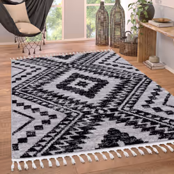 Redécouvrez un design classique et appréciez l’élégance de ces tapis à poils ras au motif diamant tendance. Raffinés, ces acc ...
