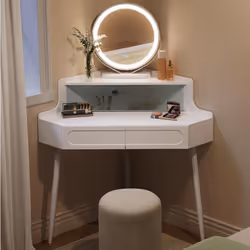 Description générale Optimisez votre espace avec cette coiffeuse d'angle au design moderne. Équipée de grands tiroirs, d'un p ...