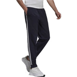 Un pantalon adidas Essentials Warm-Up Tapered 3-Stripes Bleu Homme