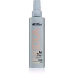Le spray effet plage Indola Salt Spray donne à vos cheveux un aspect légèrement ondulé comme au retour de la plage.