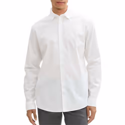 Chemise en coton blanche à pois avec une coupe droite et fermeture boutonnée