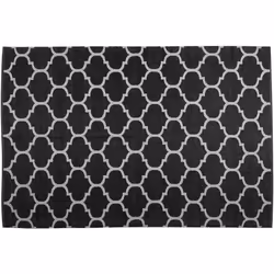 Tapis à motifs noir et blanc au style moderne. Ce tapis double face offre deux motifs modernes similaires : fond noir avec mo ...