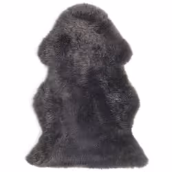 Tapis en peau de mouton authentique gris foncé style rustique. Ce tapis est un accessoire absolument incontournable et ultra- ...
