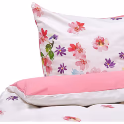Set housse de couette et taies d'oreiller rose avec motifs floraux. Le motif floral au design élégant et la combinaison de co ...