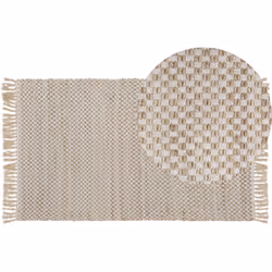Tapis en jute et coton beige avec frange et motif carreaux. La fabrication grande qualité de ce tapis à poils ras le rend trè ...