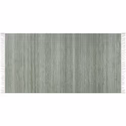 Tapis à franges unicolore. Un tel tapis est la touche finale parfaite d'un intérieur ou d'un espace extérieur comme une terra ...