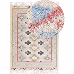 Tapis à franges fait main. Ce tapis s'intégrera parfaitement dans un intérieur bohème ou traditionnel. Il a été tissé à la ma ...