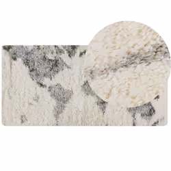 Tapis à motif abstrait. Décorez votre salon avec ce tapis moelleux et transformez l'aspect de votre intérieur en lui donnant  ...