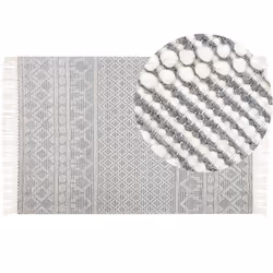 Tapis à motif géométrique. Relookez votre intérieur avec ce tapis unique. Grâce à sa couleur, il sera l'élément universel d'u ...