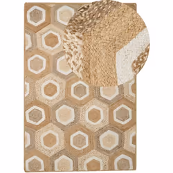 Tapis à motif géométrique. Ce tapis de jute tissé à la main est un exemple de beauté organique et de qualité artisanale. Doté ...