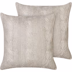 Ensemble de coussins tricotés. Fabriqué en tissu de coton durable, cet ensemble de coussins décoratifs ravivera à coup sûr l' ...