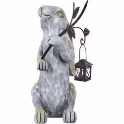 Figurine lapin décorative. Cette charmante figurine de lapin de Pâques gris, fabriquée à la main avec soin, apporte une touch ...