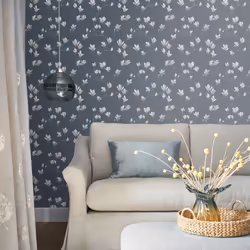 Le beau contraste entre la pureté des fleurs de magnolia et le fond d'un gris-bleu profond crée une impression de relief sur  ...