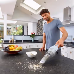 Black & Decker NVC215W aspirateur de table Bleu, Gris Sans sac