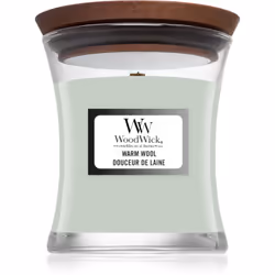 La bougie parfumée Woodwick Warm Wool embaume votre intérieur d’une agréable odeur et crée ainsi une atmosphère cosy dans laq ...
