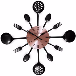 L'horloge murale Berlinger Haus en or rose et noir de la collection Black Rose est l'élément décoratif parfait pour votre cui ...