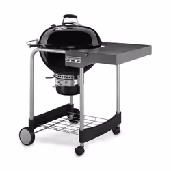 Description générale Le barbecue à charbon Performer GBS de Weber offre une expérience culinaire authentique avec des équipem ...