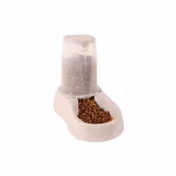 Un distributeur de croquette pour chats et chiens fabriqué en matière plastique. Distributeur transparent pour le contrôle du ...