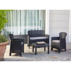Set salon d'extérieur Ostuni, Salon de jardin composé de 2 fauteuils, 1 canapé et 1 table basse, Coin salon effet rotin avec coussins, 100% Made in