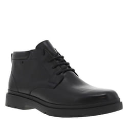 Bottines en cuir noires avec des lacets ronds et un talon plat