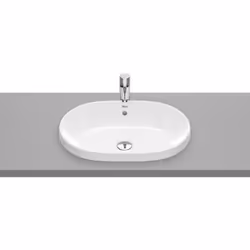 Le lavabo à poser ROUND fait partie de la collection THE GAP de ROCA . Installé sur le comptoir, il dispose d'une étagère int ...